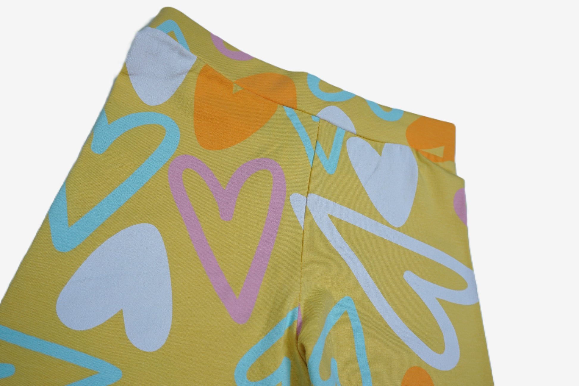 Mädchen Leggings Gelb mit buntem Herzen-Allover-Print
